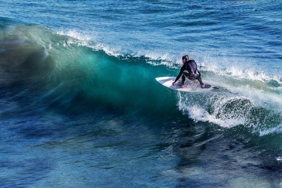 happy surfing man